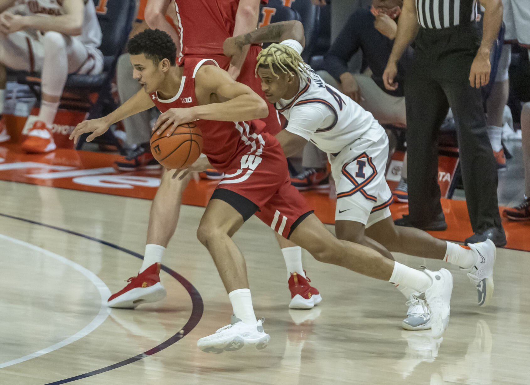Illinois 75, UW 60